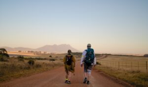 Pilgrim walking through countryside on Cape Camino in South Africa